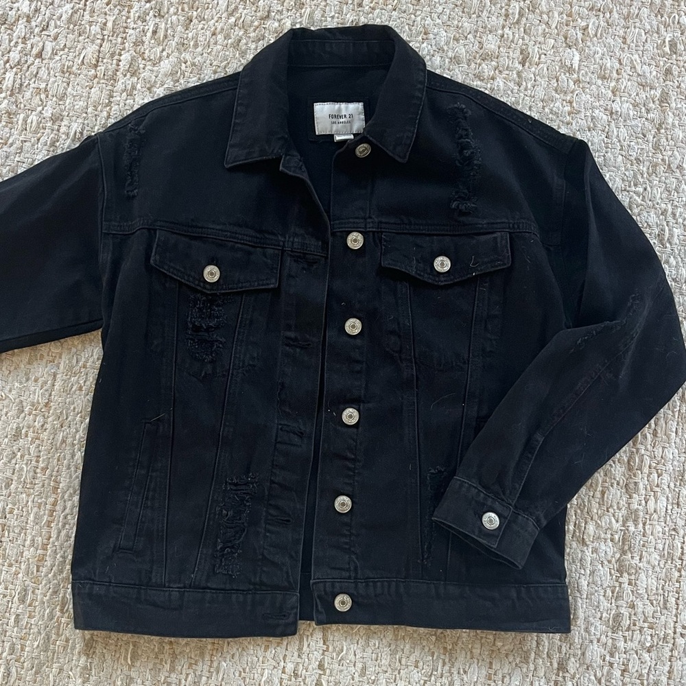 women’s black ripped jean jacket